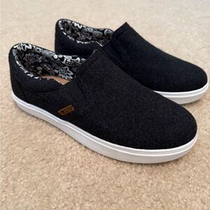 Vans Women's Black and White Slip-On Sneakers